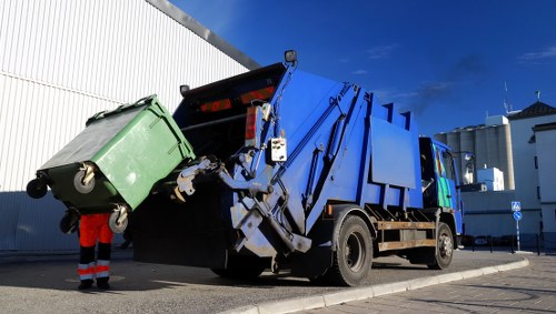 Waste collection crew coordinating an accessible pickup